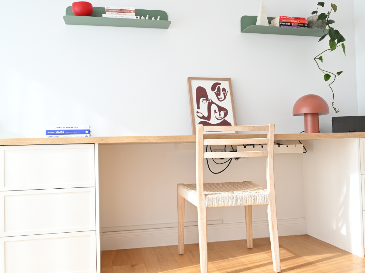 home-office-makeover-built-in-desk-ideas.jpg Space-saving workspace showcasing creative built-in desk ideas with wooden shelving, integrated task lighting, and open storage for a home office makeover.